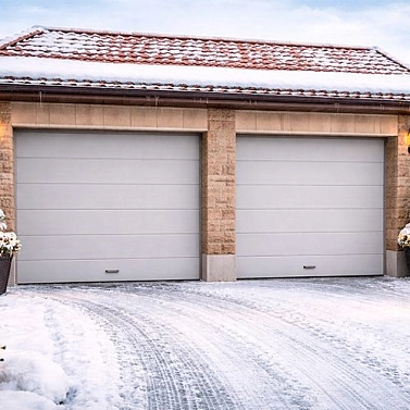 Гаражные ворота из сэндвич-панелей: почему это лучший выбор для утепленного гаража