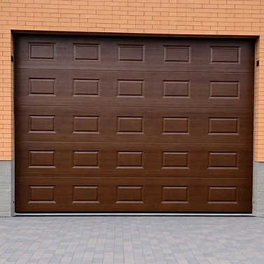 Секционные ворота с автоматикой: как выбрать привод и пульт дистанционного управления